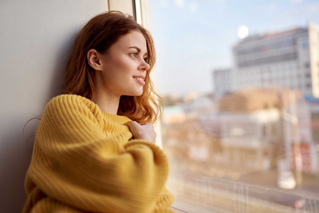 Hopeful woman at housing shelter