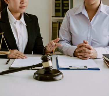 Legal advisor is explaining to a client
